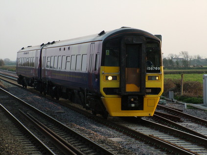 Ex-Transpennine 158769 on a local stopping service