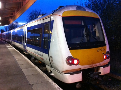 A somewhat battle scarred 168215 waits at Leamington Spa