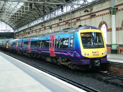 170308 with a Hull service at Manchester Piccadilly