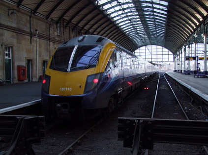 First Hull Trains liveried 180113 at the impressive Paragon Station