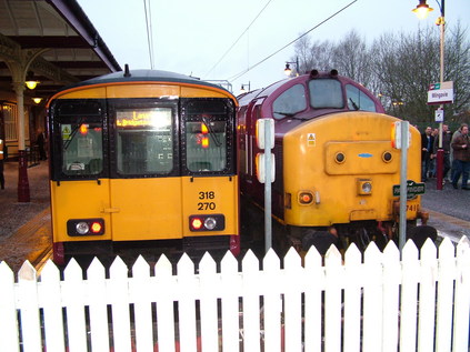 37410 alongside a more frequent visitor at Milngavie