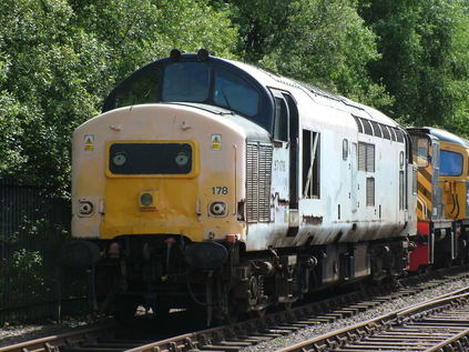 37178 awaiting work on a yard shuttle train