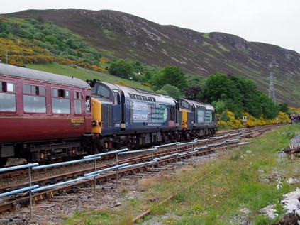 37608 and 37610 under brooding skies at Helmsdale