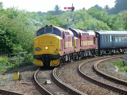 37670 leads the train off St. Blazey Depot