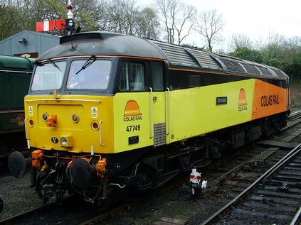 47749 'Demelza' waits to join the train at Bodmin General