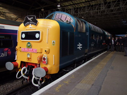 A group of regimental colleagues stand with 55022 at Edinburgh Waverley