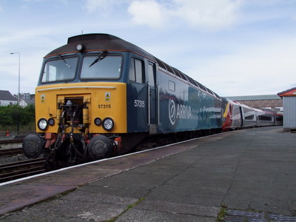 57315 prepares to drag 390023 back to Crewe