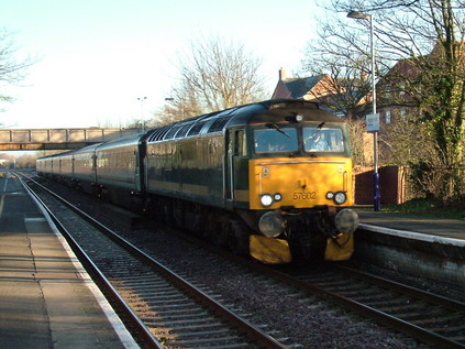 57602 with sleeper stock running as 1C02 at Highbridge