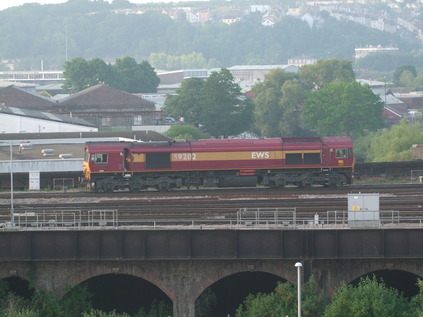 59202 runs around the stock at a hazy Bristol Temple Meads
