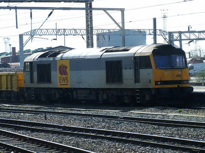 60076 passes Crewe with an engineers working