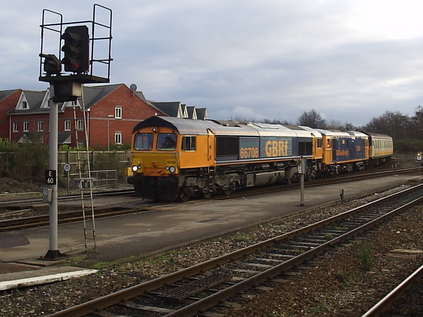 66708 leads 73204 and two Class 205 DEMUs through Exeter St. Davids