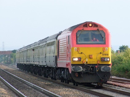 Substituting for steam, 67018 passes Highbridge