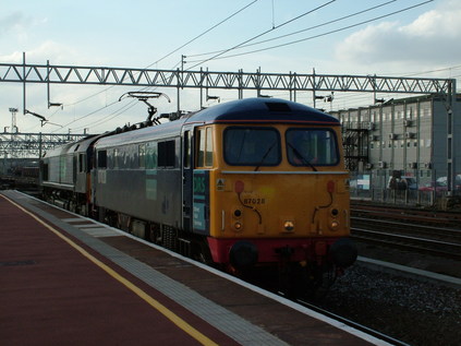 87028 leads 66410 on the Malcolm train