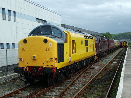 97301 and 37676 wait in the former platform at Aberystwyth