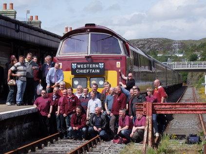 Those responsible for getting us here pose with the loco