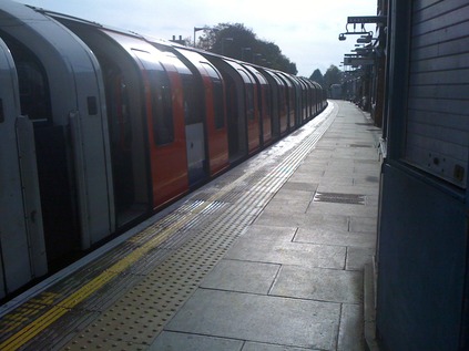 Autumn sunshine on wet platforms at TFL's Epping outpost