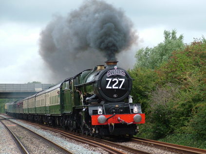 6024 leads the Torbay Express south through Highbridge