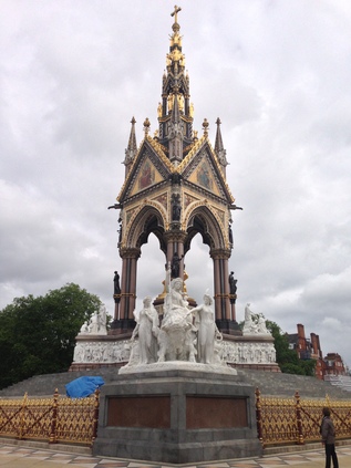 The Albert Memorial glistens in the gloom